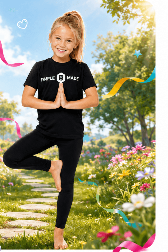 A Temple Made student practicing a balanced yoga pose in a colorful outdoor garden